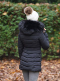 Karcsúsított középhosszú meleg női fekete télikabát fekete prémmel